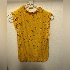 Great to dress up or down blouse. Very light material.